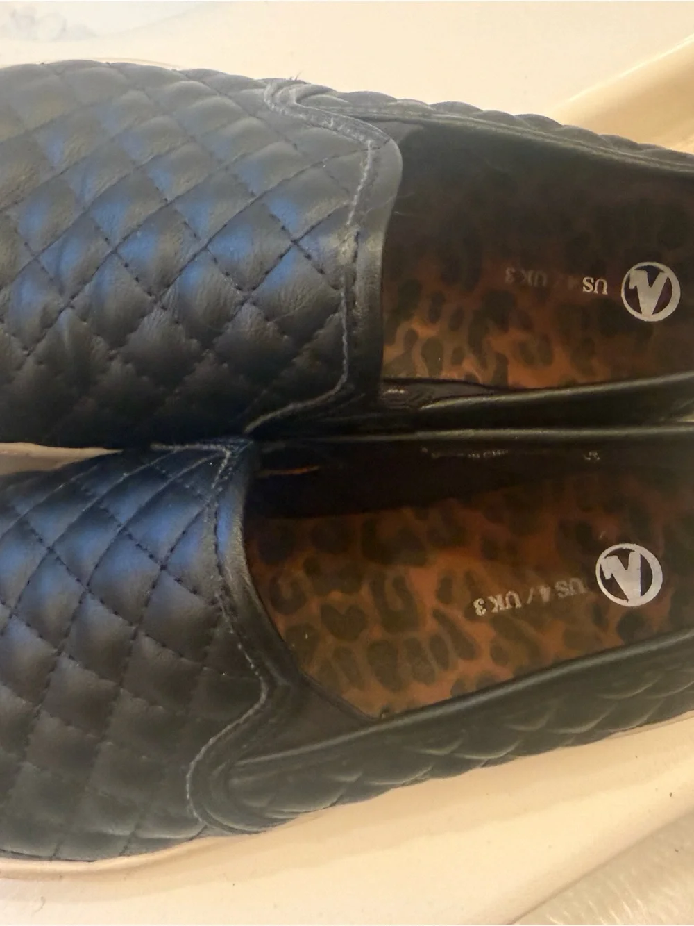 Kids Quilted Slip-On Moccasins in Black size 4